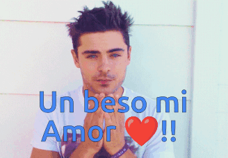 A Man With His Eyes Closed And The Words " Un Beso Mi Amor " On The Bottom GIF