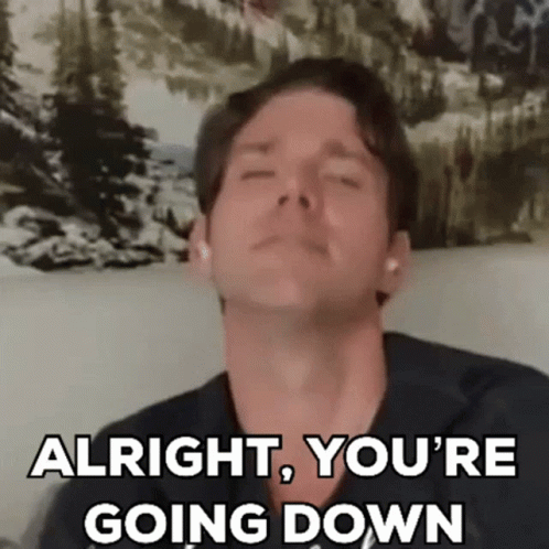 A Man With His Eyes Closed Is Saying `` Alright , You 'Re Going Down '' GIF