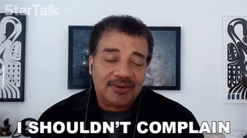 A Man With His Eyes Closed Is Saying I Should N't Complain . GIF