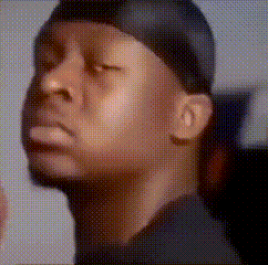 A Man With His Eyes Closed Wearing A Bandana GIF