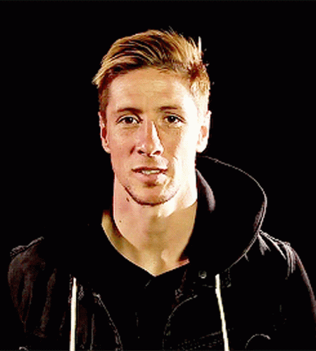 A Man With His Eyes Closed Wearing A Black Sweatshirt GIF