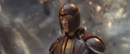 A Man With His Eyes Closed Wearing A Helmet And Armor GIF