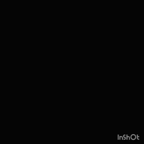 A Man With His Hands In His Pockets Stands In Front Of A Large House GIF