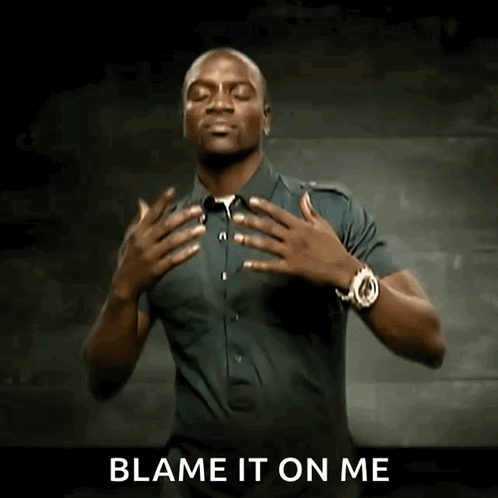 A Man With His Hands On His Chest And The Words Blame It On Me Behind Him GIF