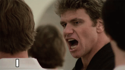 A Man With His Mouth Open And A Number 1 On The Bottom Right GIF