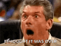 A Man With His Mouth Open And A Surprised Look On His Face . GIF