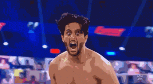 A Man With His Mouth Open In A Boxing Ring With A Sign That Says Lucky In The Background GIF