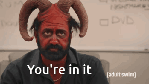 A Man With Horns And Red Paint On His Face Says " You 'Re In It " GIF