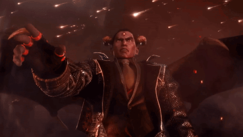 A Man With Horns And Wings Is Standing In Front Of A Fireball GIF
