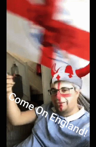 A Man With Horns Painted On His Face And The Words Come On England Written Below Him GIF