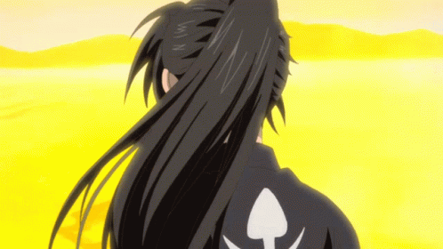 A Man With Long Black Hair And A White Spade On His Back GIF