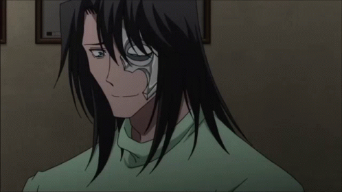 A Man With Long Black Hair Is Wearing A Green Shirt And Has The Number 3 On His Face GIF