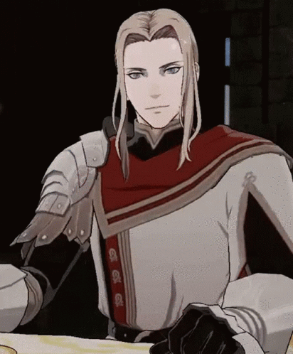 A Man With Long Blonde Hair Is Wearing Armor And A Cape GIF