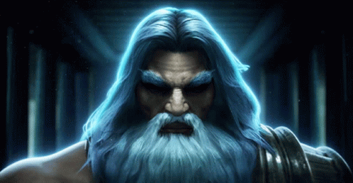 A Man With Long Blue Hair And A Beard Is Looking At The Camera GIF