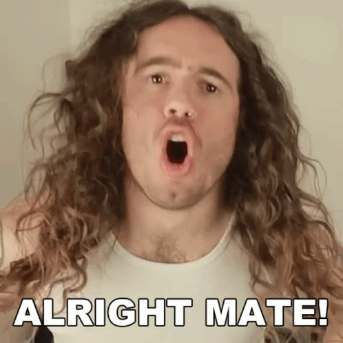 A Man With Long Curly Hair Has His Mouth Open And The Words Alright Mate Below Him GIF