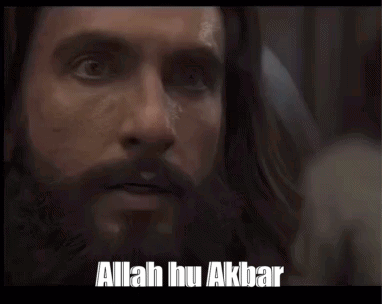 A Man With Long Hair And A Beard Has The Words Allah Hu Akbar Written On His Face GIF