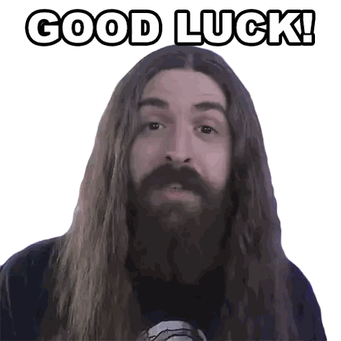 a man with long hair and a beard has the words good luck above him