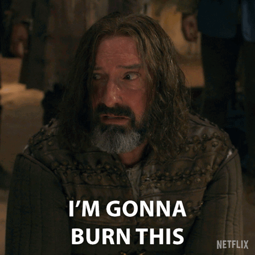 A Man With Long Hair And A Beard Has The Words Place To The Ground Written On His Face GIF