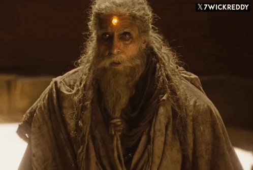 A Man With Long Hair And A Beard Has X7wickreddy Written On The Bottom Of The Image GIF