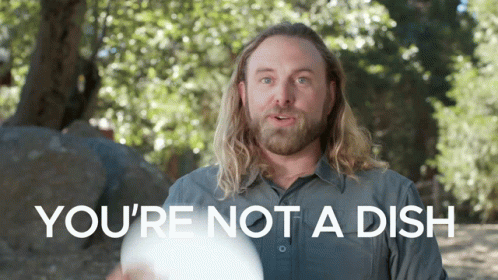 A Man With Long Hair And A Beard Is Holding A Frisbee And Says You 'Re Not A Dish GIF