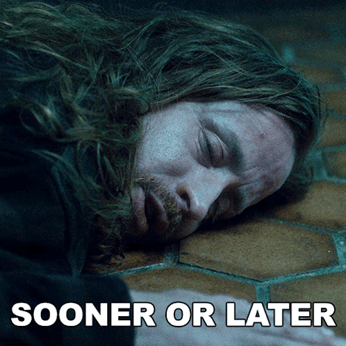 A Man With Long Hair And A Beard Is Laying On The Floor With The Words Sooner Or Later Below Him GIF
