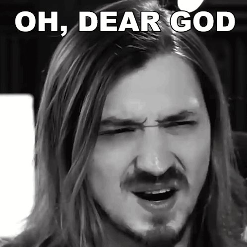 A Man With Long Hair And A Beard Is Making A Funny Face With The Words Oh Dear God Above Him GIF