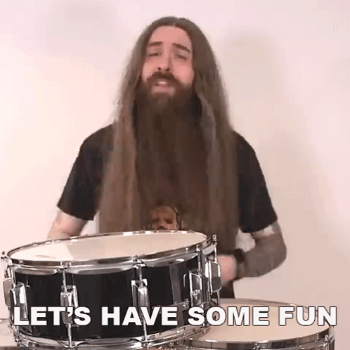 Man With Long Hair And Beard Playing Drums GIF