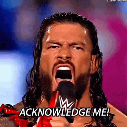 A Man With Long Hair And A Beard Is Screaming Into A Microphone And Says Acknowledge Me GIF