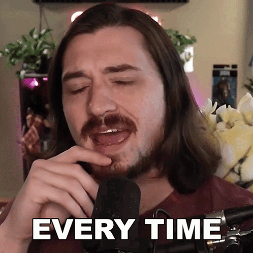 A Man With Long Hair And A Beard Is Singing Into A Microphone With The Words Every Time Written Below Him GIF