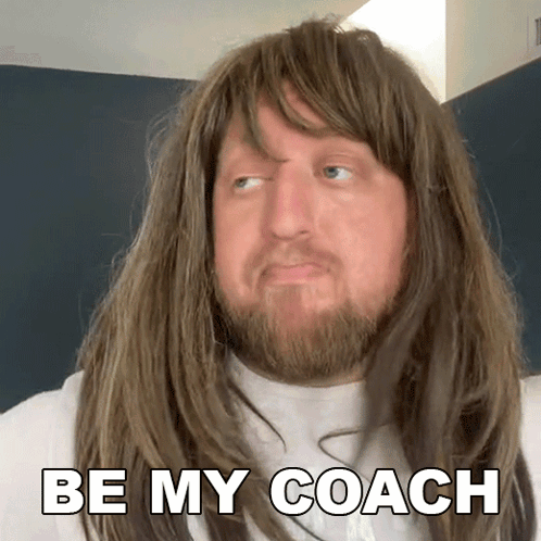 A Man With Long Hair And A Beard Is Wearing A Wig And Says Be My Coach GIF