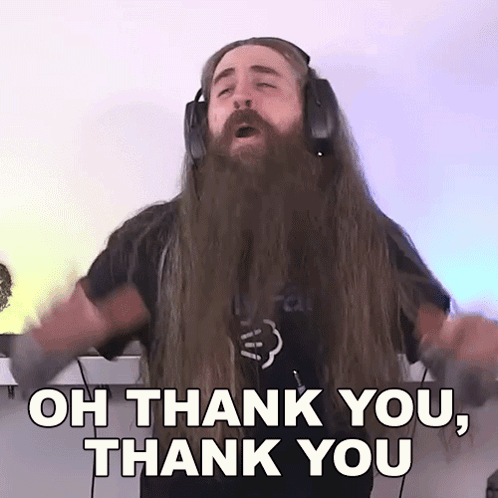 A Man With Long Hair And A Beard Is Wearing Headphones And Saying Oh Thank You Thank You . GIF