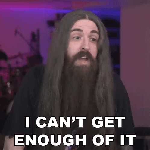 A Man With Long Hair And A Beard Says I Can T Get Enough Of It GIF