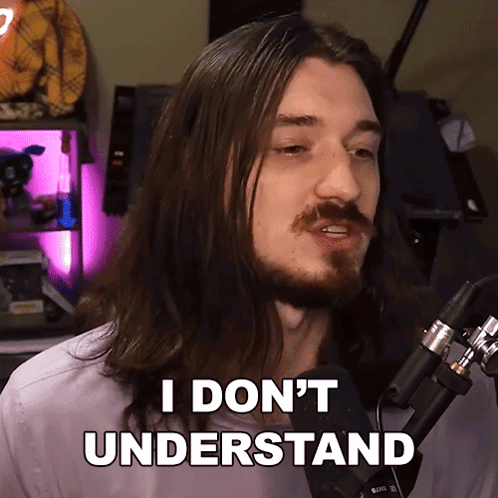 A Man With Long Hair And A Beard Says I Don 'T Understand In Front Of A Microphone GIF