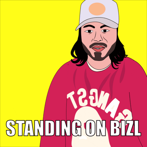 A Man With Long Hair And A Beard Wearing A Red Shirt That Says T2ma Standing On Bizl GIF
