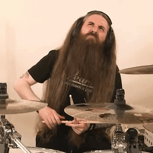 Man With Long Hair And Beard Wearing Out Shirt GIF