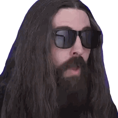 a man with long hair and a beard wearing sunglasses looks surprised
