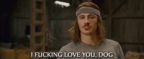 A Man With Long Hair And A Headband Says I Fucking Love You Dog . GIF