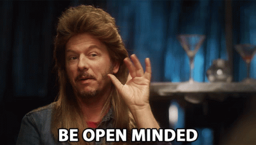 A Man With Long Hair And A Mullet Says " Be Open Minded " GIF