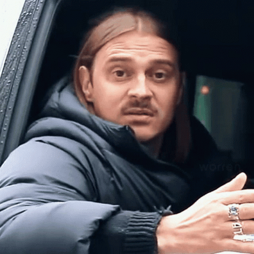 Man With Long Hair And Mustache Wearing Warren Ring GIF