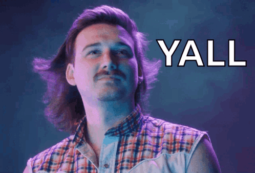 A Man With Long Hair And A Mustache Says Yall GIF