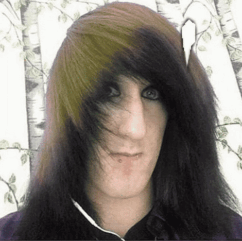 A Man With Long Hair And A Nose Piercing GIF
