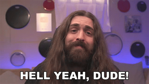 A Man With Long Hair And Beard Says Hell Yeah Dude GIF