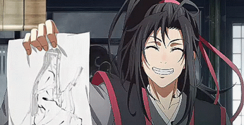 A Man With Long Hair Is Holding A Piece Of Paper With A Drawing Of A Hand On It . GIF