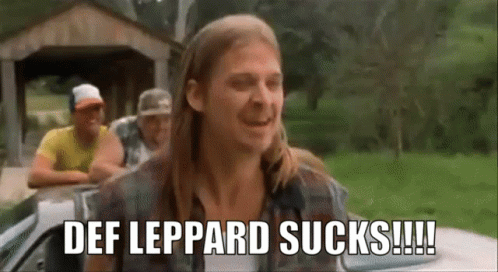 A Man With Long Hair Is Saying Def Leppard Sucks !!! GIF