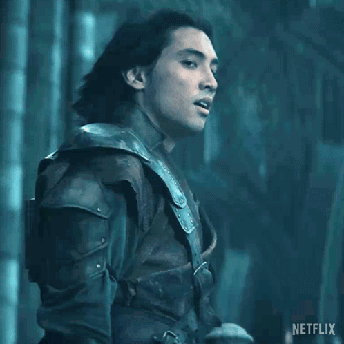 A Man With Long Hair Is Standing In Front Of A Sign That Says " Kill Them All " GIF