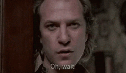 a man with long hair is talking to a woman and asking her if she is a great , big , fat person .