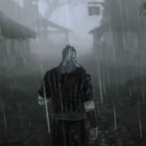 A Man With Long Hair Is Walking Through The Rain GIF