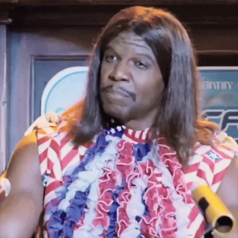 A Man With Long Hair Is Wearing A Red , White And Blue Shirt And A Lei . GIF