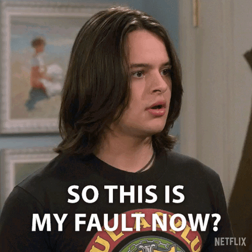 A Man With Long Hair Is Wearing A T-Shirt That Says So This Is My Fault Now GIF