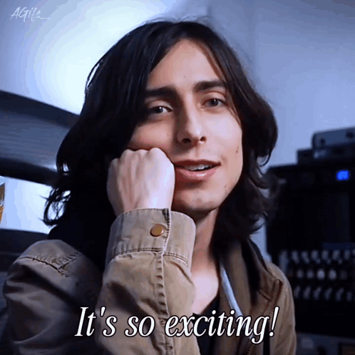 A Man With Long Hair Says " It 'S So Exciting ! " GIF